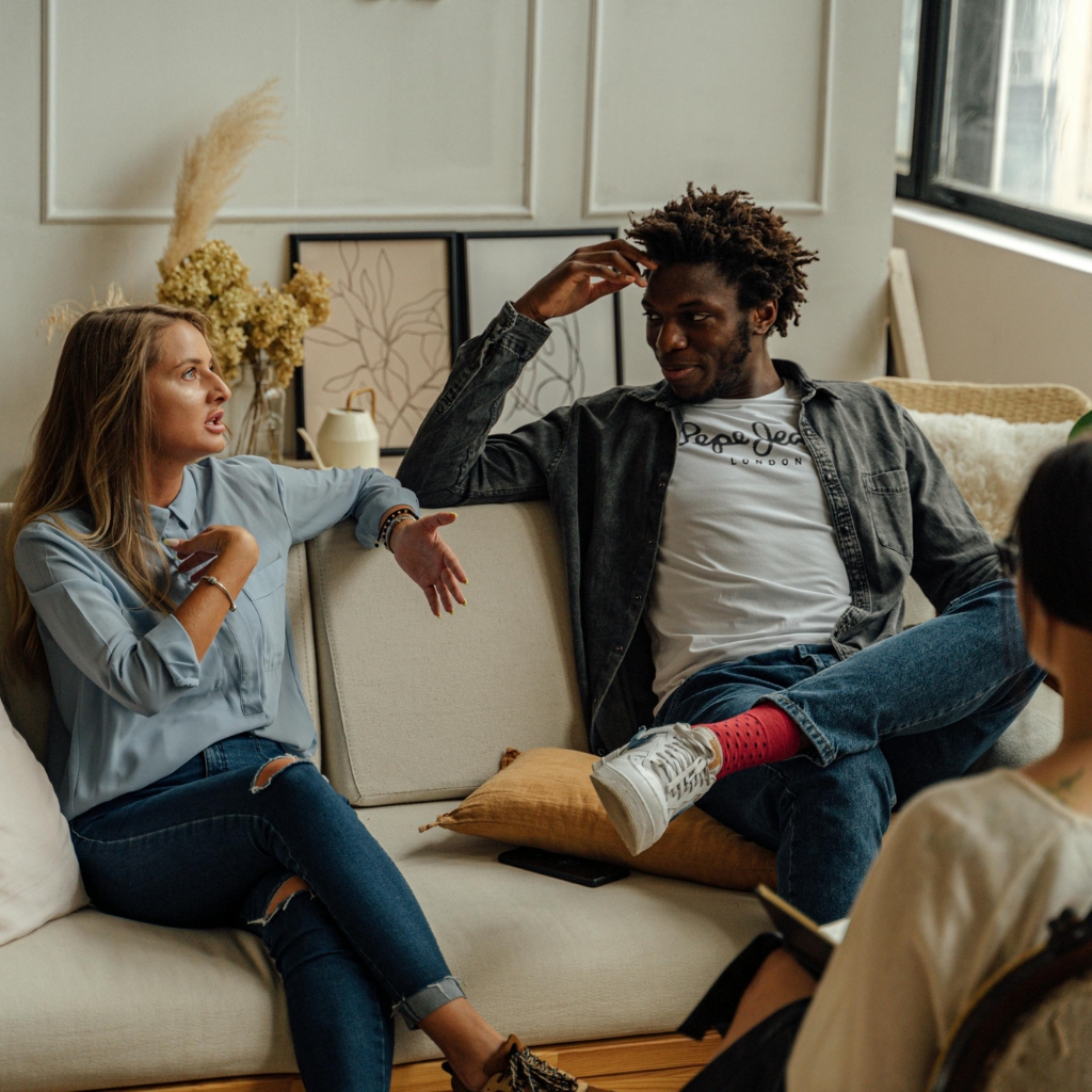 Therapist providing guidance to a client in a supportive session